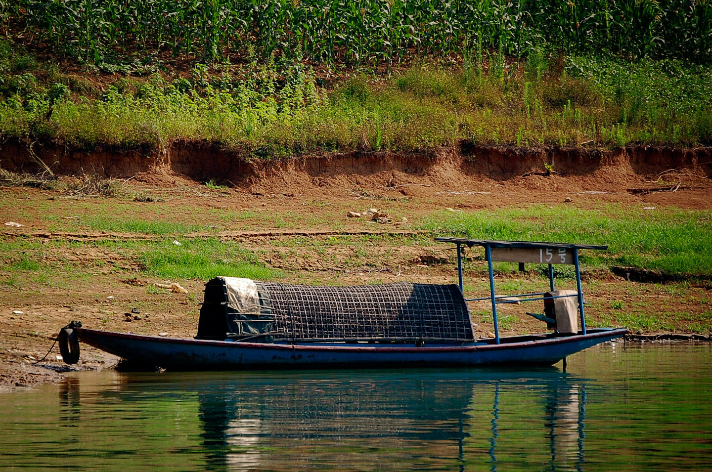Chinese Farmer with Fishing Boat Tracy McCrackin Photography - Tracy McCrackin Photography